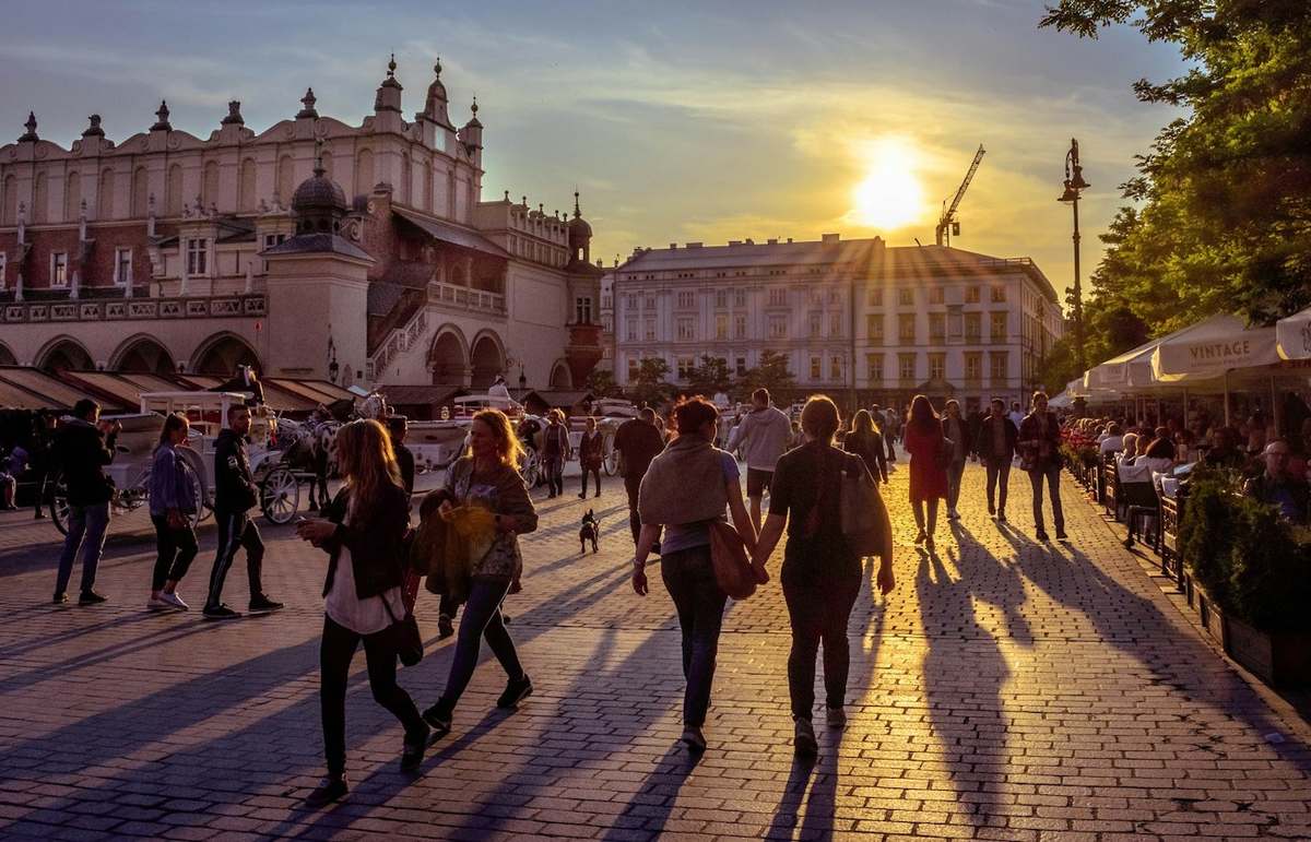 Cloth Hall at sunset — evening stroll hour